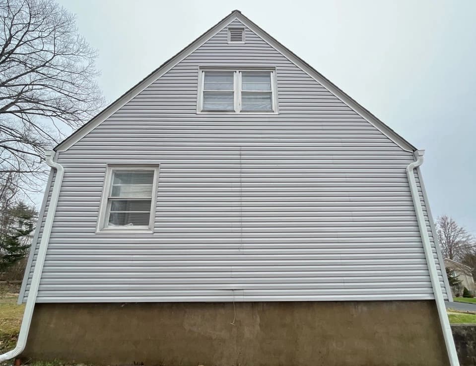 Twinsburg Power Washing technician performing detailed house washing in Twinsburg residential area