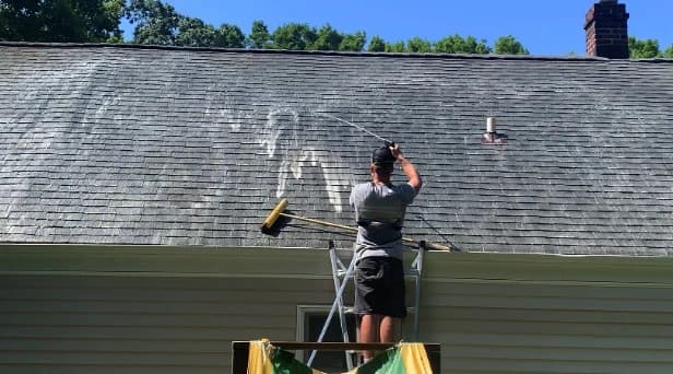 Before and after results of roof washing by Twinsburg Power Washing in Twinsburg